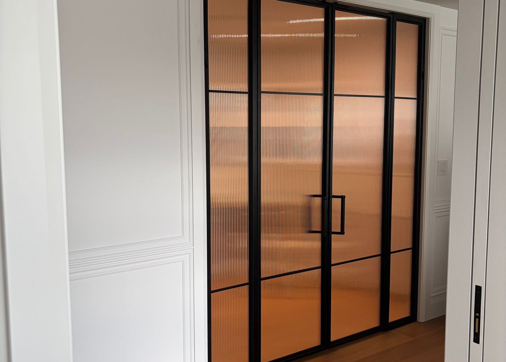 Metal framed glass door